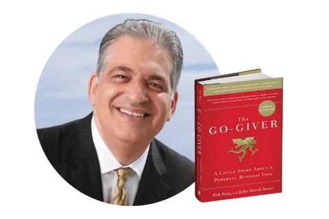 Bob Burg with a copy of The Go-Giver