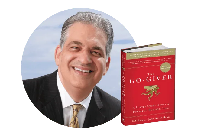 Bob Burg with a copy of The Go-Giver