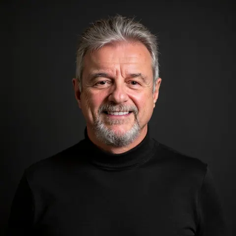 Jeff C. West headshot in a black turtleneck